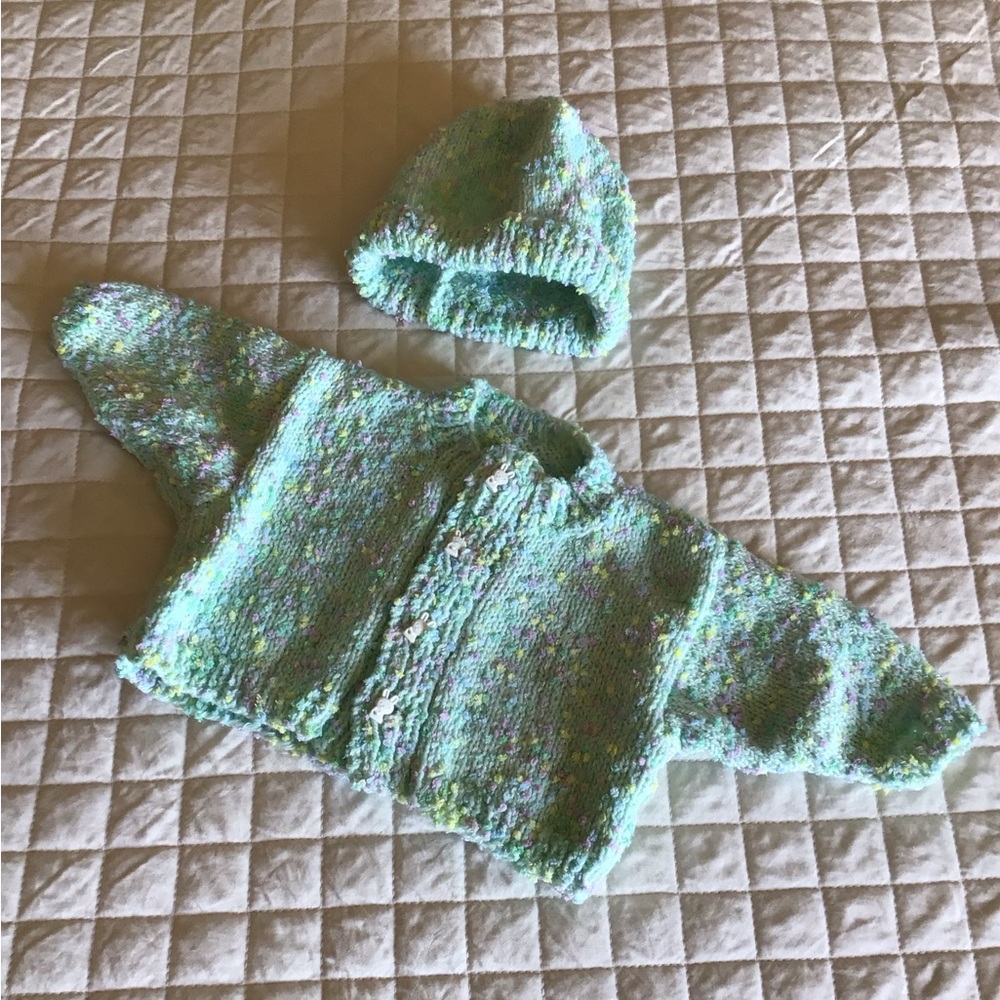 Hand knit baby sweater and hat